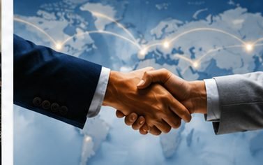 Representatives shaking hands on an education partnership